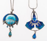 A group of two Arts & Crafts silver and enamel pendants, a blue enamelled pendant by James Fenton,