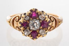 An antique ring, possibly Victorian, in the form of a flowerhead,
