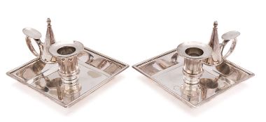 A pair of electro plated nickel silver chamber sticks by Richard Hodd & Son London,