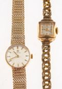 Omega a 9ct gold lady's wristwatch the brushed silvered dial having raised baton numerals and hands