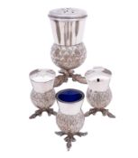 A four piece silver plated cruet set in the shape of thistles,