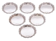 A set of six Elizabeth II silver wine glass coasters by Deakin & Francis Ltd, Birmingham 1988,