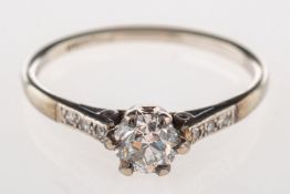 A diamond ring, claw set to the centre with an old-cut diamond, diamond approx. 0.