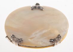 A Georgian magnifying glass in an oval white mother of pearl case, metal unmarked and untested,