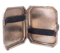 A George VI silver cigarette box by Spiers & Wordsworth, Birmingham 1934, of rectangular form,
