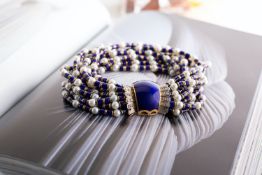 An impressive enamel, diamond and cultured pearl torsade bracelet,