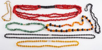A mixed group of bead necklaces to include a green quartzite bead necklace with a clasp marked 375;