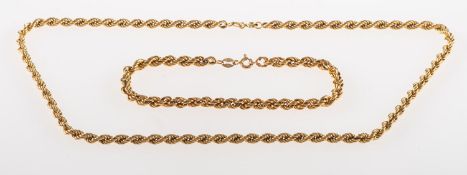 A 9ct gold necklace and bracelet, both of rope twist design, UK import marks,