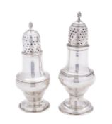 A George III silver caster by Thomas Daniell, London 1776, of baluster form, with pull off lid,