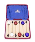 A set of George VI silver gilt and enamel Art Deco coffee spoons by Adie Brothers Ltd,