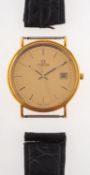 Omega, a gentleman's 18k wristwatch the gilded dial signed Omega, and having raised baton numerals,