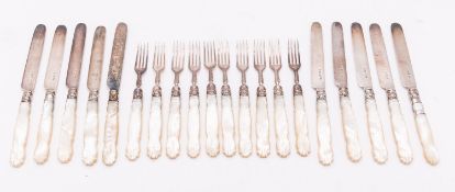 A set of ten Victorian silver and mother of pearl fruit knives and forks by Aaron Hadfield,