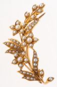 An antique flower spray brooch, set with small pearls & split pearls, unmarked & untested,