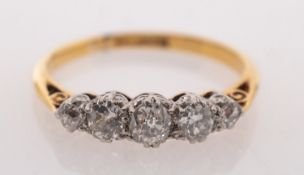A five stone diamond ring, claw set with five graduated old-cut diamonds, diamonds approx. 0.