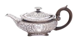 A George II silver tea pot by Samuel Hennell, London, 1817, of circular form,