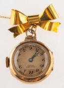 A 9ct gold watch brooch, a 9ct gold cased vintage J.W.