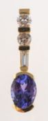 A tanzanite and diamond pendant, set with two brilliant-cut diamonds,