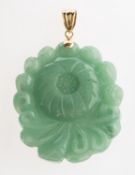 A jade pendant, a carved jade pendant of flowerhead form, bale marked 14k, jade measuring approx. 4.
