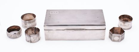 A George V silver cigarette casket by Walker & Hall, Sheffield 1939, of rectangular form,