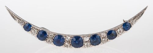 A fine Victorian sapphire and diamond crescent brooch,