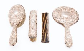 An Elizabeth II silver backed dressing table set by Henry Bushell & Co, Birmingham 1972,