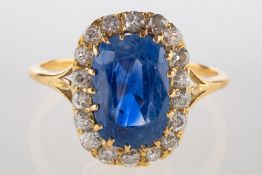 A sapphire and diamond cluster ring,