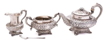A Victorian silver matched three piece tea service, comprising tea pot by William Chawner London,