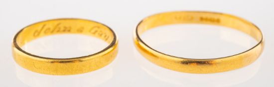 A group of two 18ct gold wedding bands, both UK hallmark, sizes L and V1/2 to W, (band squashed),