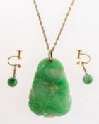 A group of two items of jade jewellery, including a foliate carved jade pendant with loop bale,