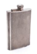 A large silver plated hip flask by Walker & Hall,