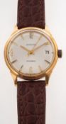 WITHDRAWN Garrard an 18K gold gentleman's wristwatch the silvered dial having Roman and baton