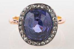 An antique purple sapphire and diamond ring,