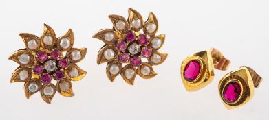 A group of two pairs of earrings originating from India,