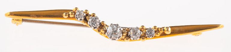 An early 20th century 22ct gold and diamond brooch,