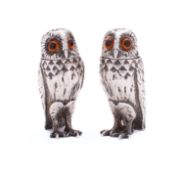 A pair of 20th century silver owl salt and pepper, stamped SILVER,