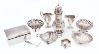 A mixed group of silver; including a large silver sugar shaker Birmingham 1918, of canted form,