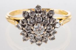 An 18ct gold diamond cluster ring, set with brilliant-cut diamonds, diamonds approx. 1.