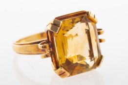 A citrine cocktail ring, claw set with a rectangular mixed-cut citrine, citrine approx. 9.