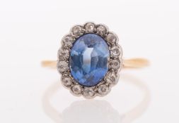 A synthetic sapphire and diamond cluster ring,