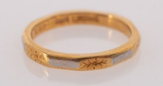 An 18ct gold band,