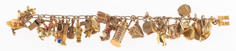 A charm bracelet with attached charms, a curb link bracelet, marked 375,