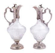 An Elizabeth II glass and silver claret jug by M.