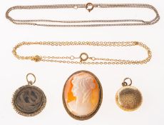 A group of two mourning pendants and a cameo, two mourning lockets with glass compartments,