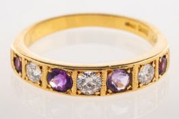 An amethyst and diamond eternity ring,