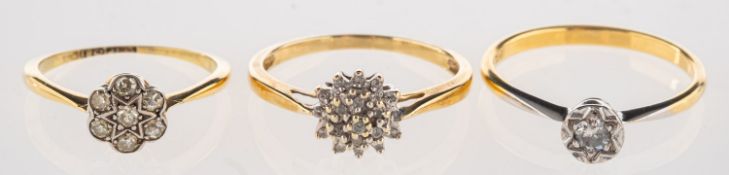 A group of three diamond rings,