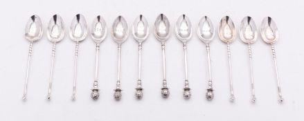 Golfing interest; A set of cast George V silver teaspoon, Docker & Burn Ltd, Birmingham 1928,