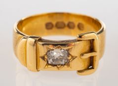 An antique diamond buckle ring, set with an old cushion-cut diamond, diamond approx. 0.