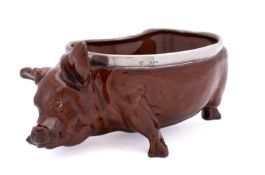 An Edward VII silver mounted pottery pig by George Betjemann & Sons, London 1908,