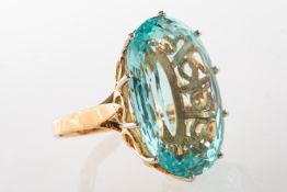 A French mid-century aquamarine cocktail ring, set with an oval-mixed cut aquamarine, approx. 26.