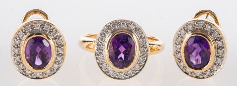 An amethyst and diamond ring and earrings,